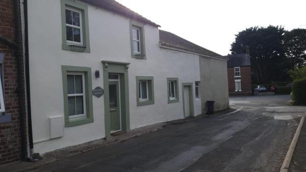 A la foto es mostra l'objecte Victoria Cottage situat a la ciutat de Whitrigg.