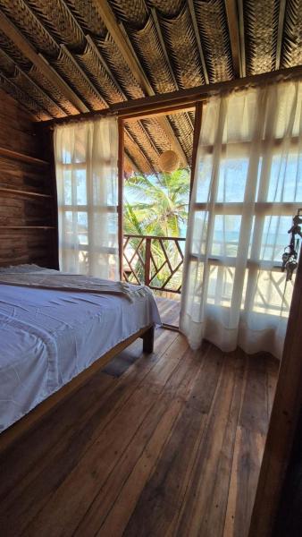 Auf dem Foto ist das Objekt Puerto Manglar Hostal in der Stadt Guachaca zu sehen.