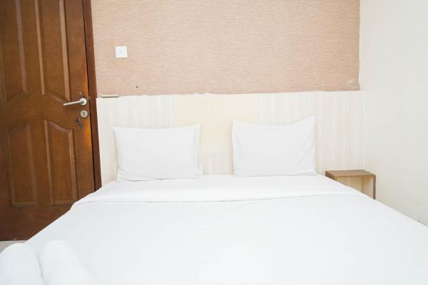Kuvassa näkyy kohde Comfort 2BR Apartment at Great Western Resort By Travelio, joka sijaitsee kaupungissa Pumpangsineng.