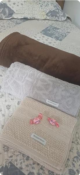 På billedet ses objektet Suíte privativa em casa de família - ENTRADA INDEPENDENTE - a tranquilidade - conforto e privacidade que vc procura - super limpinha com cozinha em BARÃO GERALDO- perto de tudo e sossego total beliggende i byen Campinas.