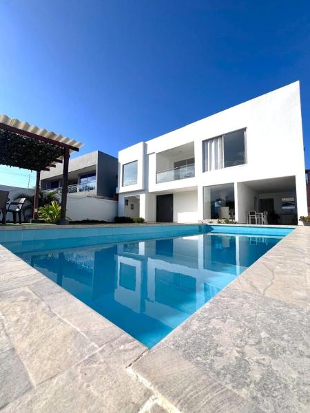 A la foto es mostra l'objecte Villa de Lujo con Piscina Privada y BBQ, Cerca al Mar - Casa Abigail situat a la ciutat de El Jobo.