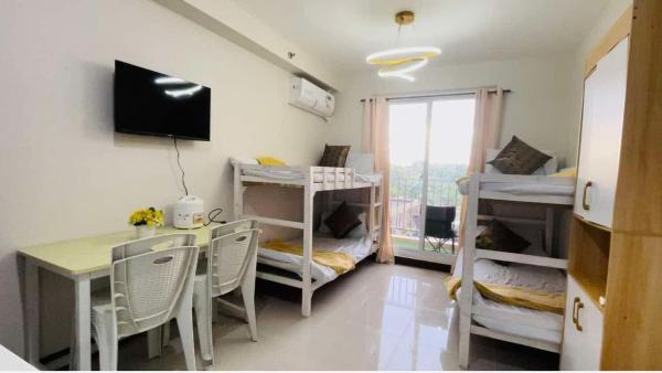 The photo shows the 329 Elegant Studio Unit good for 4 person located in the city of Pajo.