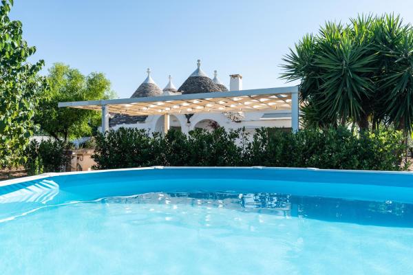 På billedet ses objektet I trulli di Morena by BarbarHouse beliggende i byen Castellana Grotte.