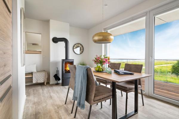 A la foto es mostra l'objecte BeachLoungeThree- 1 OG, Meerblick, Balkon, Kamin, Sauna situat a la ciutat de Olpenitz.