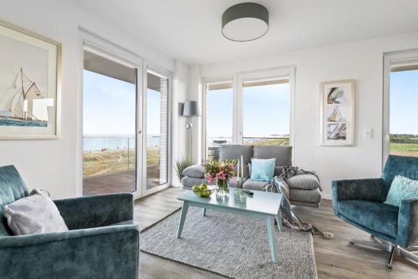 A la foto es mostra l'objecte BeachWaveFour- 2OG, Meerblick, Balkon, Kamin, Sauna situat a la ciutat de Olpenitz.