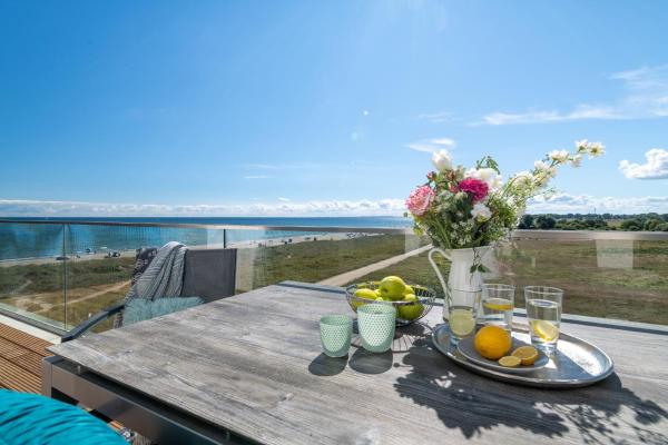 A la foto es mostra l'objecte BeachViewTwo- 3OG, Meerblick, Balkon, Kamin, Sauna situat a la ciutat de Olpenitz.