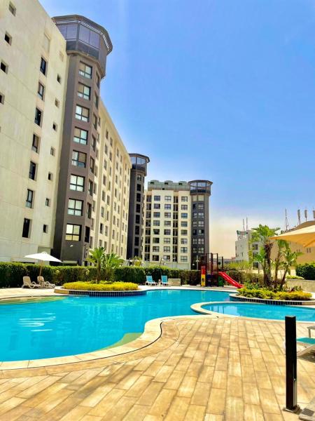 A la foto es mostra l'objecte Porto Cairo - In the Heart of New cairo situat a la ciutat de El Caire.