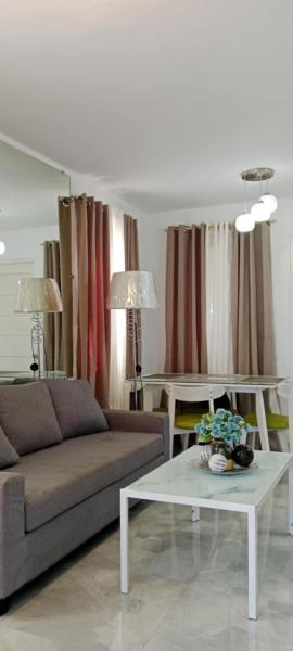 The photo shows the Rhexus Homestay located in the city of Ba-an.