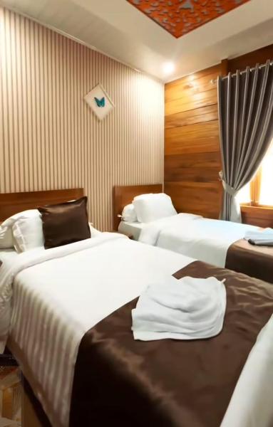 The photo shows the Kamang Resort and Convention Center located in the city of Bukittinggi.