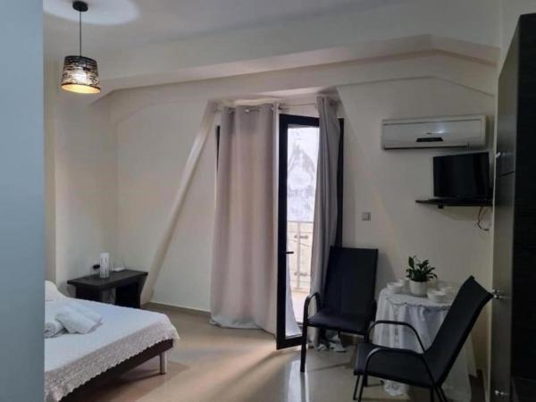 На фото показан объект Cozy Studio Image, расположенный в городе Иерапетра.