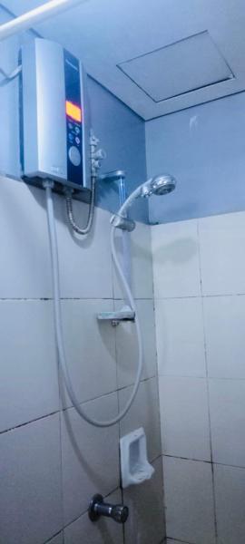 Avida sm sucat quest house condo hotel, Manille