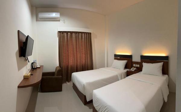 写真にはBarabai市にあるArraudah Hotel Syari'ahが写っています。