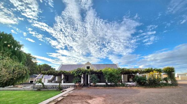 The photo shows the The Old Farmhouse - Farm Stay located in the city of Loxton.
