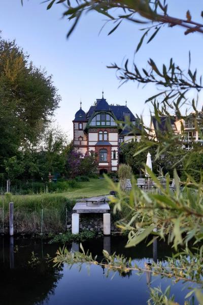 A la foto es mostra l'objecte Villa Daries - Ferienwohnung mit eigenem Müritzstrand situat a la ciutat de Waren.