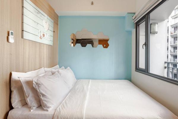 Kuva 3: ClaySky Staycation S2T1-Cozy & Homey 1BR Apartment near MOA facing Pool with Own Parking with Netflix, HBO Max YouTube Premium & up to 200mbps Wifi
