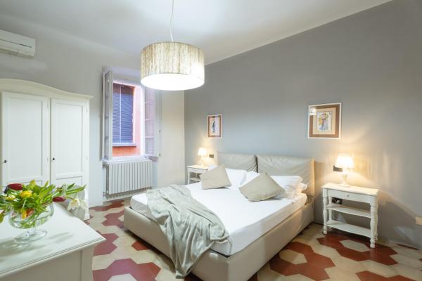 A la foto es mostra l'objecte Toselli Suite Apartment situat a la ciutat de Pisa.