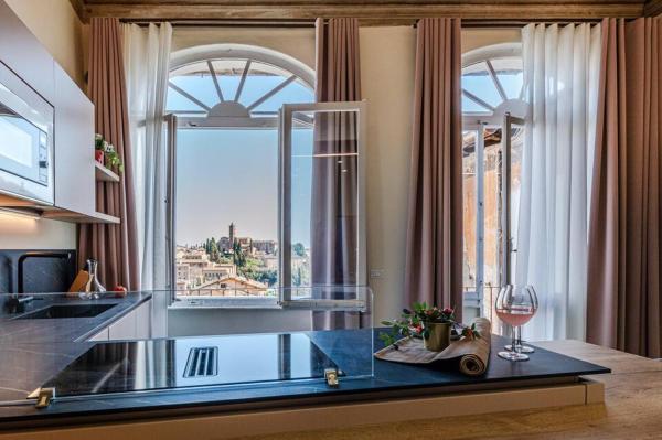 På billedet ses objektet Rose - Appartamento in centro storico con balcone con vista beliggende i byen Siena.