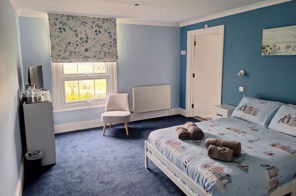 På billedet ses objektet Ensuite Double Room with Countryside Views beliggende i byen Hascombe.
