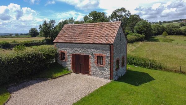 A la foto es mostra l'objecte Red Tiles Barn situat a la ciutat de Batcombe.