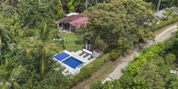 Auf dem Foto ist das Objekt Hostal Casa del Rio in der Stadt Guachaca zu sehen.