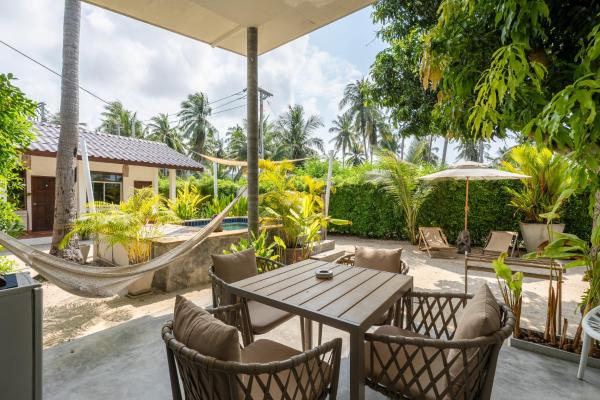 Foto 1: Sun & Sand Bungalows