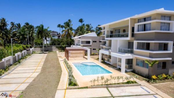 Op de foto is het object Caribey2 APT 2D2 te zien, gelegen in de stad Básima.