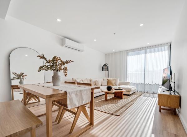 The photo shows the Spacious 1-Bed Apartment with Gym, BBQ & Parking located in the city of Fyshwick.