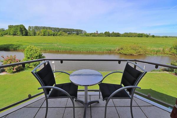 Nella foto è visibile l'oggetto NEU! Ferienwohnung am idyllischen Tief - Nordsee situato nella città di Dornum.