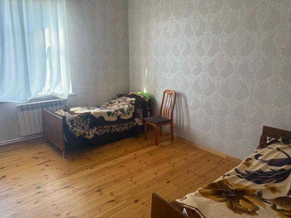 The photo shows the Natig House located in the city of Qullar.