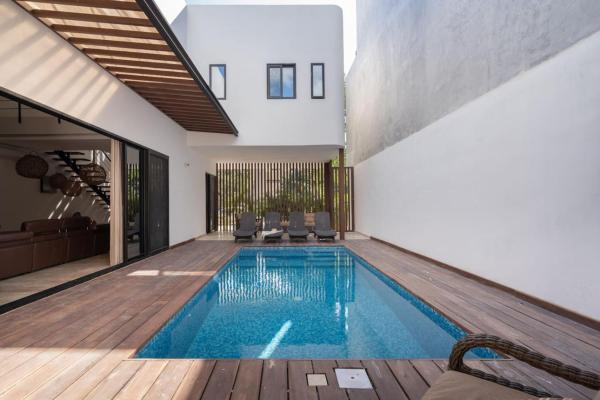 Na zdjęciu widoczny jest obiekt Villa Amalia 5 bdr w Private Pool in Aldea Zama położony w mieście Tulum.
