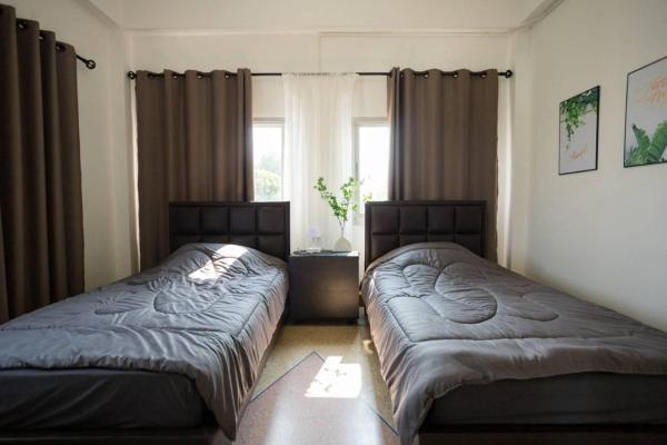A la foto es mostra l'objecte CozyRooms Korat situat a la ciutat de Ban Nong Bo.