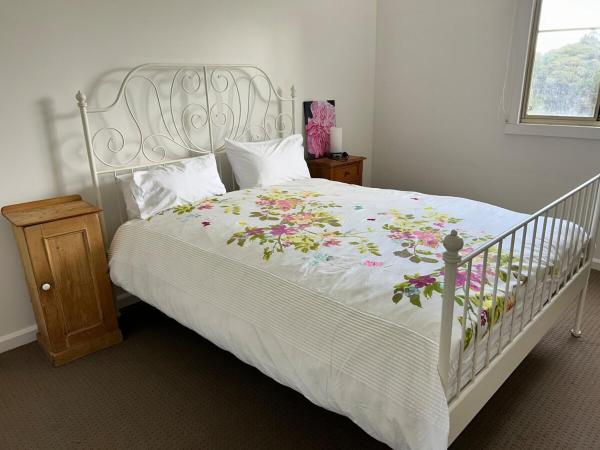 The photo shows the Grandad's farmhouse located in the city of Northcliffe.