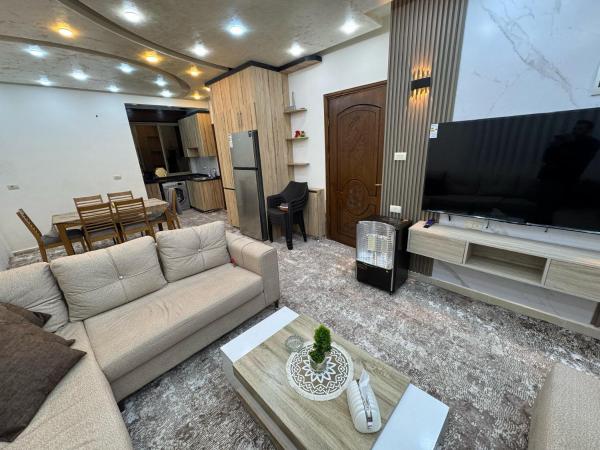 Nella foto è visibile l'oggetto شقه مفروشه حديثة ذات أطلالة جميلة ومكان هادئ situato nella città di Dayr as Si‘nah.