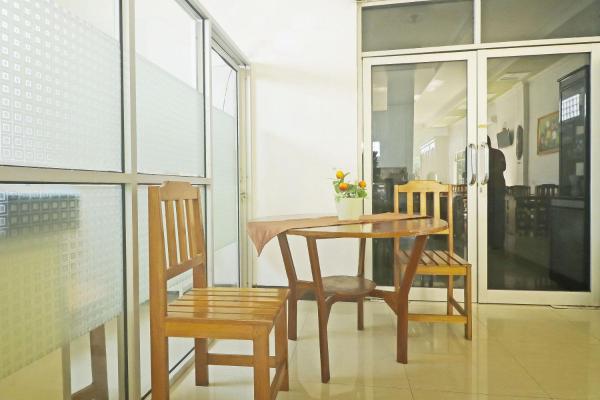The photo shows the Hotel O Papi Inn Guesthouse located in the city of Tumbangrungan.