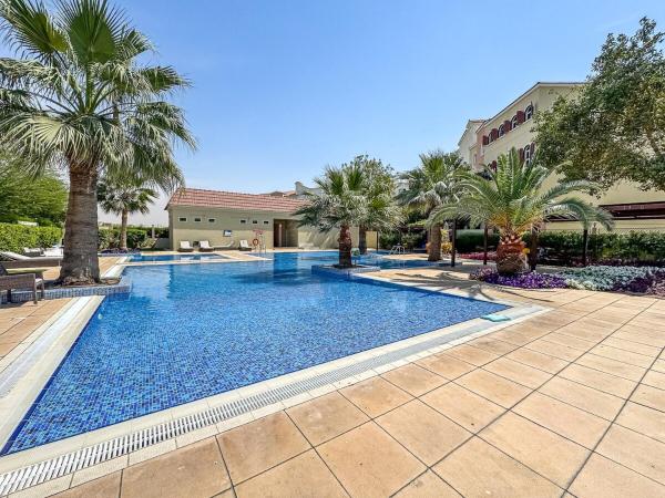 A la foto es mostra l'objecte Studio Haven with Pool, Tennis and Kid's Playground situat a la ciutat de Dubai.