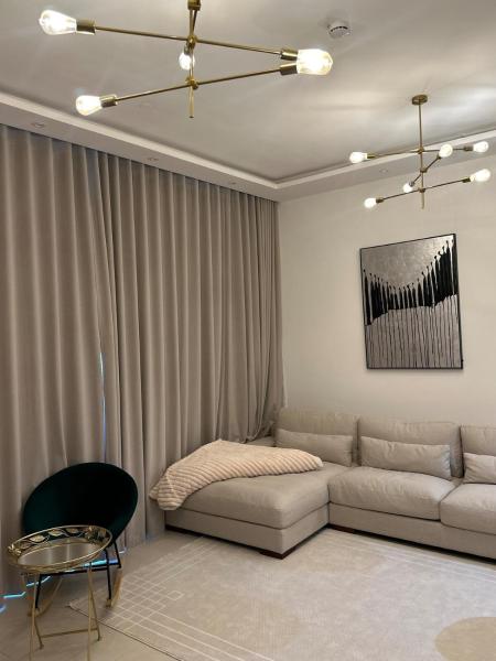 The photo shows the Comfortable apartment with a sense of hotel located in the city of Jayf.