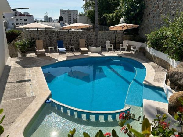Na fotografii je vidět objekt Secretos del Sol Acapulco villas a 5 minutosdel mar nacházející se ve městě Acapulco.