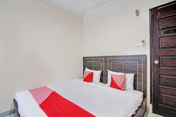 Na fotografii je vidět objekt Hotel O Rosela House Syariah nacházející se ve městě Kelapas.