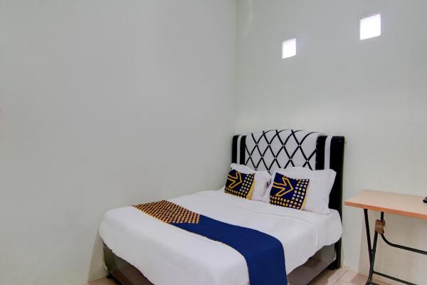 På billedet ses objektet Hotel O Awi Stay Syariah Near SIMPANG KAWASAN INDUSTRI WILMAR PELINTUNG beliggende i byen Dumai.