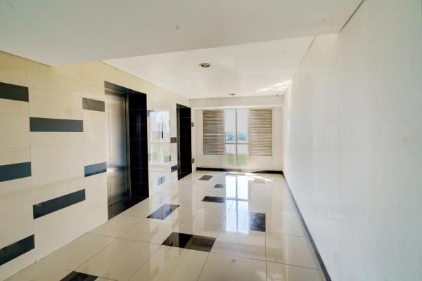 Na fotografii je vidět objekt OYO Life 92874 Apartement Grand Sentraland Karawang By Red Dragon nacházející se ve městě Jaken 1.