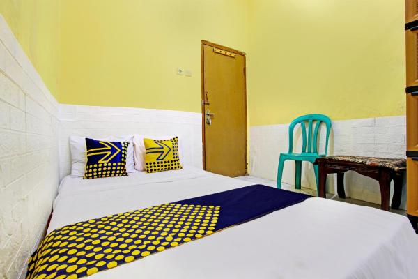 Op de foto is het object Hotel O Juan Kostel te zien, gelegen in de stad Kembaran.
