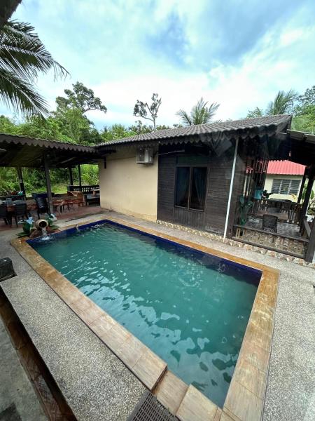 På billedet ses objektet Teratak Nurul Kuala Kangsar with swimming pool - no pork or alcohol beliggende i byen Kuala Kangsar.