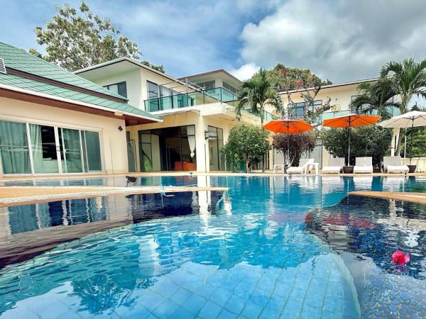 The photo shows the Chuan SeaFront Villa Rawai Phuket located in the city of Rawai Beach.