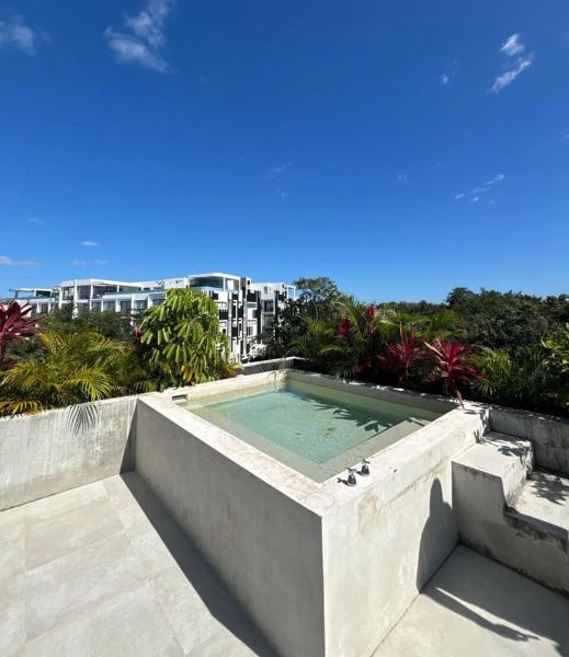Na zdjęciu widoczny jest obiekt Penthouse con jacuzzi privado en Aldea Zama, Tulum położony w mieście Tulum.