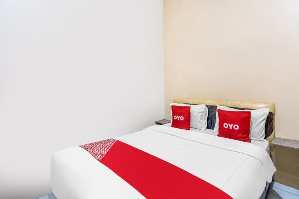 Auf dem Foto ist das Objekt OYO 91361 Benlin D'kost Syariah in der Stadt Kedungredjo zu sehen.