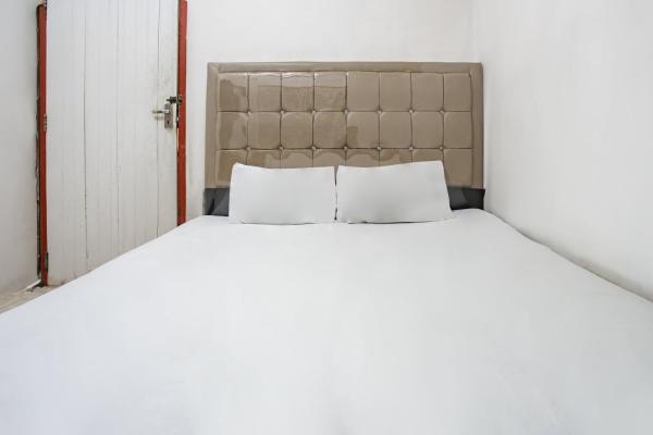 A la foto es mostra l'objecte Hotel O Penginapan Tulimario Syariah situat a la ciutat de Jambi.