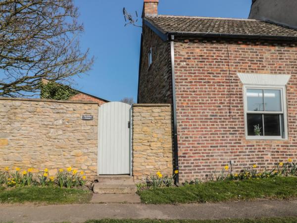 A la foto es mostra l'objecte Top Holme Cottage situat a la ciutat de Hotham.