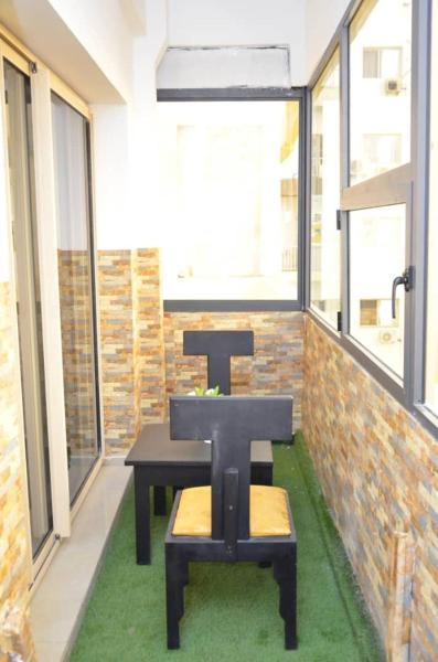 The photo shows the Appartement Spacieux à la Cité d'Émergence 2 chambres located in the city of Médina.