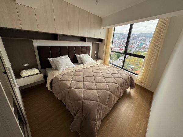 The photo shows the Departamento moderno y Cómodo, 3 Hab, 2 Baños y buena vista located in the city of Huanchac.