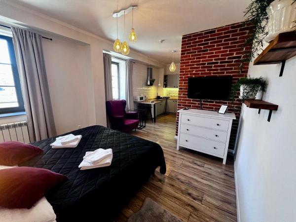 Na fotografii je vidět objekt Apartamenty Łowicz nacházející se ve městě Łowicz.